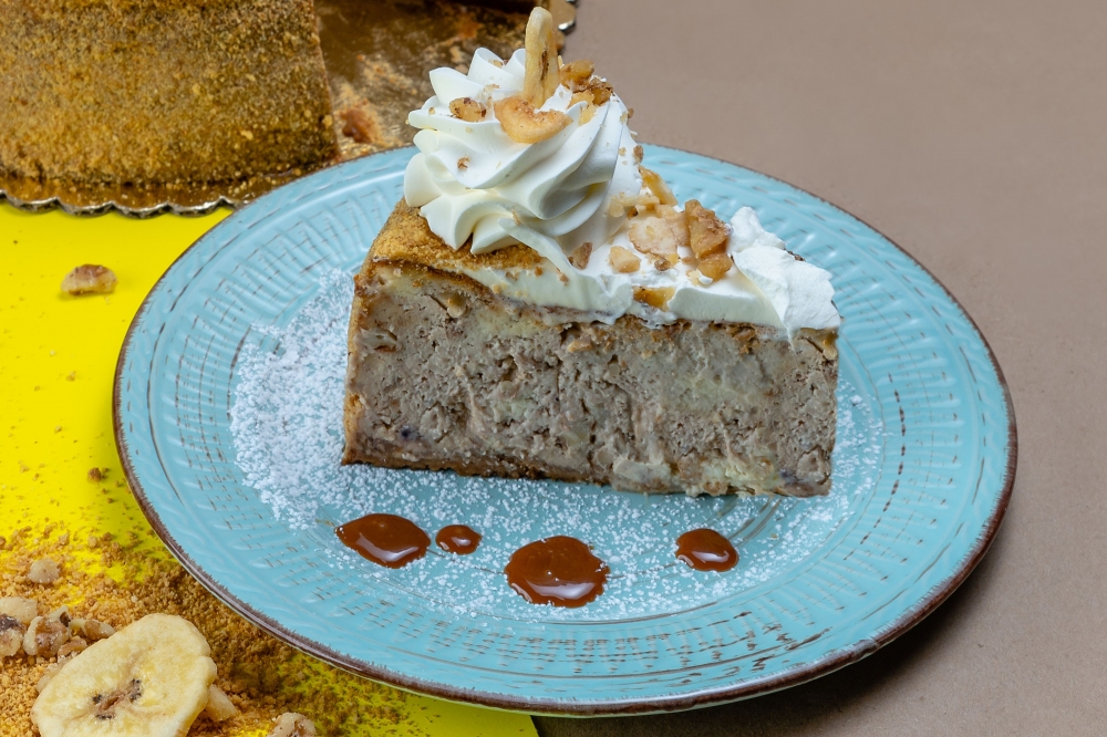 Rebanada de Pastel Queso con Plátano 