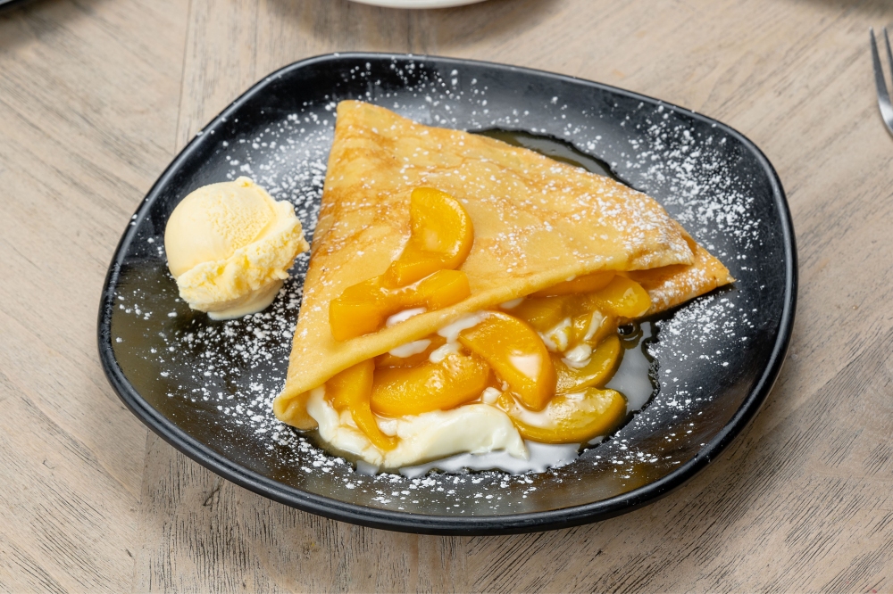 Crepa de Duraznos Flameados